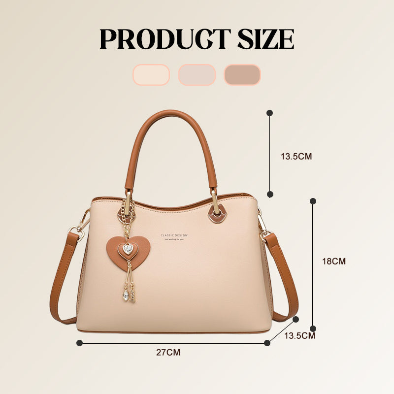 Elegant women's handbag with sparkling heart pendant