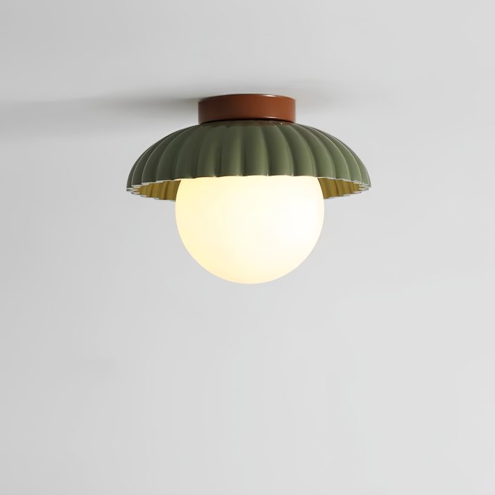 Ceiling lamp with a milk glass shade providing warm lighting in the hallway