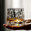 SwirlSip – Rotatable, textured whiskey glass with a striking ribbed design