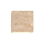 Wall lamp made of travertine for a warm and elegant atmosphere