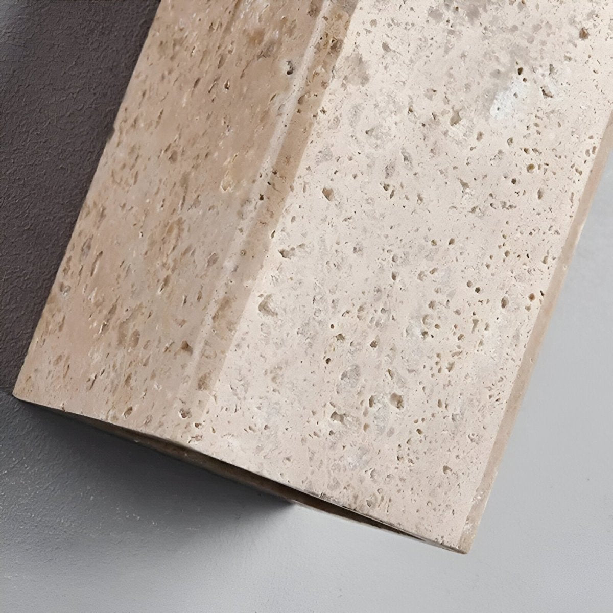Wall lamp made of travertine for a warm and elegant atmosphere