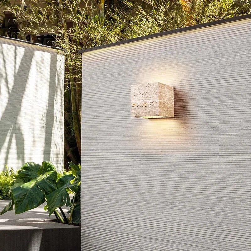 Wall lamp made of travertine for a warm and elegant atmosphere