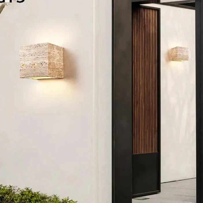 Wall lamp made of travertine for a warm and elegant atmosphere