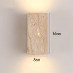 Wall lamp made of travertine for a warm and elegant atmosphere