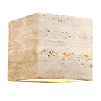 Wall lamp made of travertine for a warm and elegant atmosphere