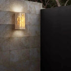 Wall lamp made of travertine for a warm and elegant atmosphere