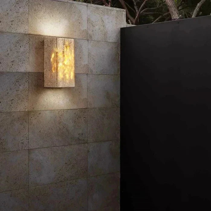 Wall lamp made of travertine for a warm and elegant atmosphere