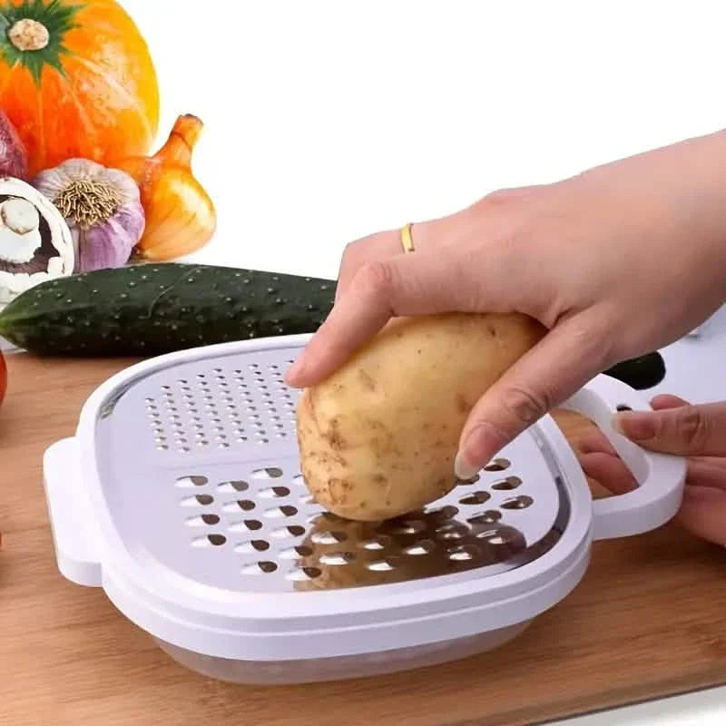 Vegetable slicer with lid and draining basket