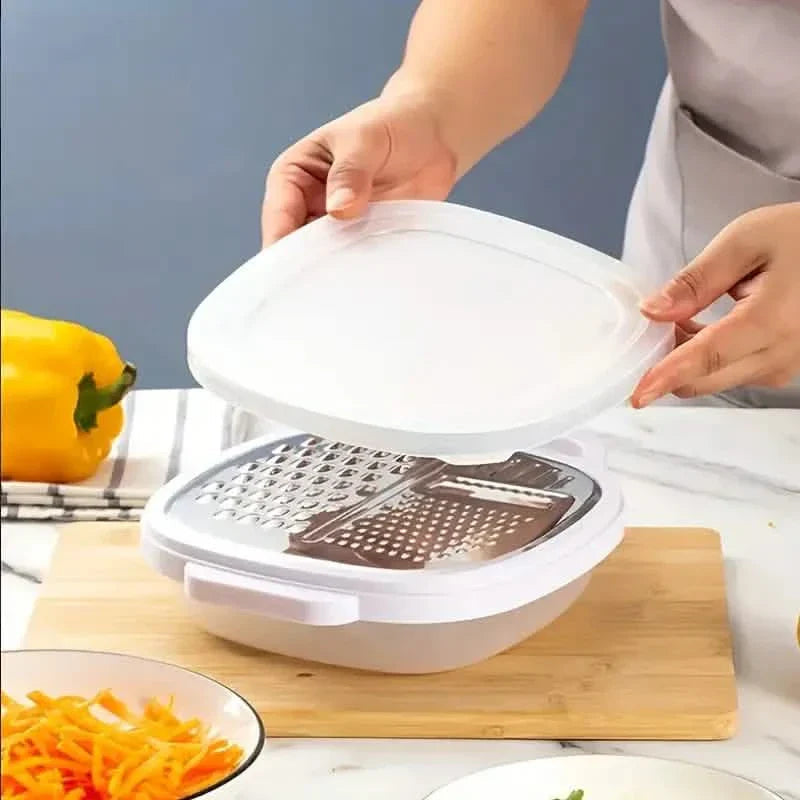 Vegetable slicer with lid and draining basket