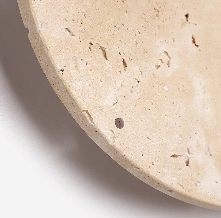 Awaken your space with the Wabi-sabi wall clock made of travertine